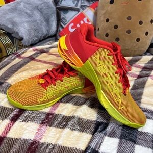 Red and Yellow Athletic Shoes Nike metcon shoes